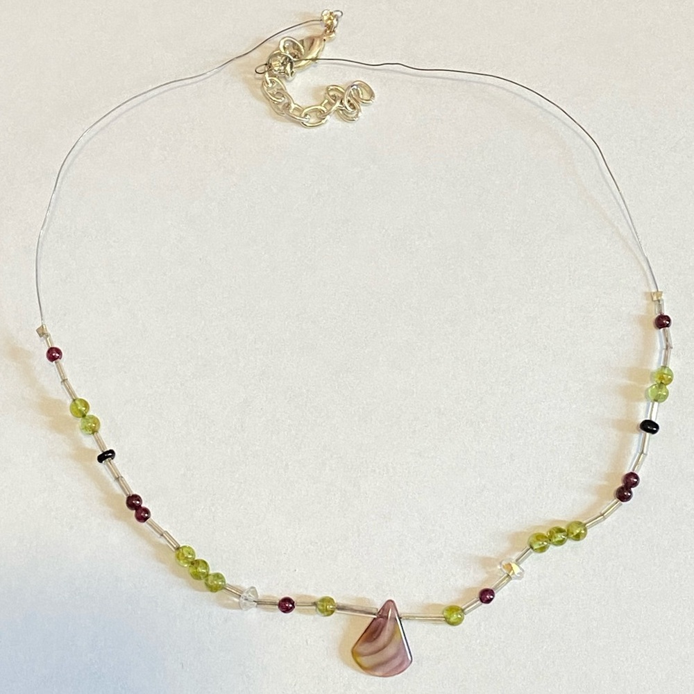 Silver wire necklace with green/purple/brown beads